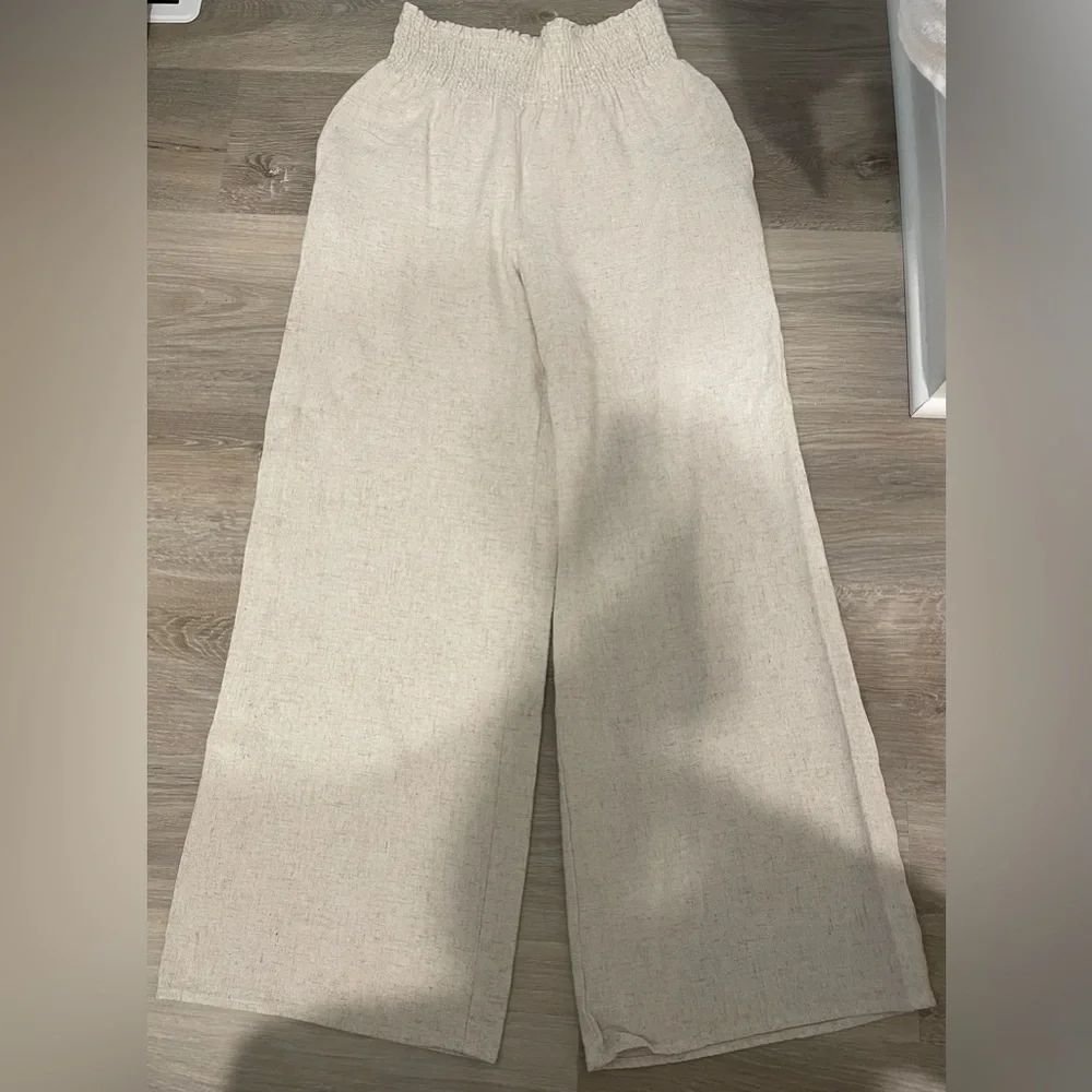 Lulu’s hit the breeze beige smocked wide legged pants - Picture 2 of 3